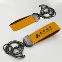 Thumbnail for Spring Airlines Horseshoe Buckle key chain in yellow