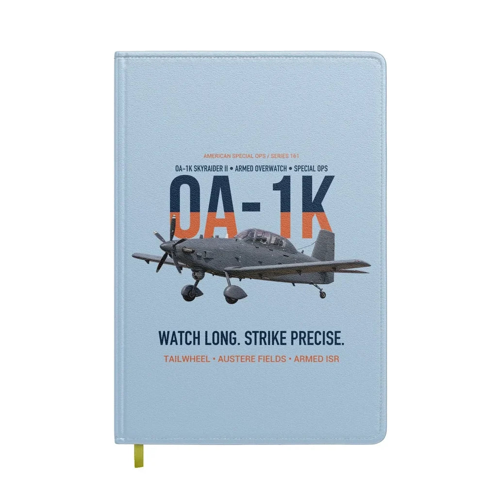 OA-1K Skyraider II Armed Overwatch design on light blue notebook