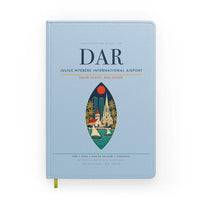 Thumbnail for Julius Nyerere International Airport (DAR) design on light blue notebook
