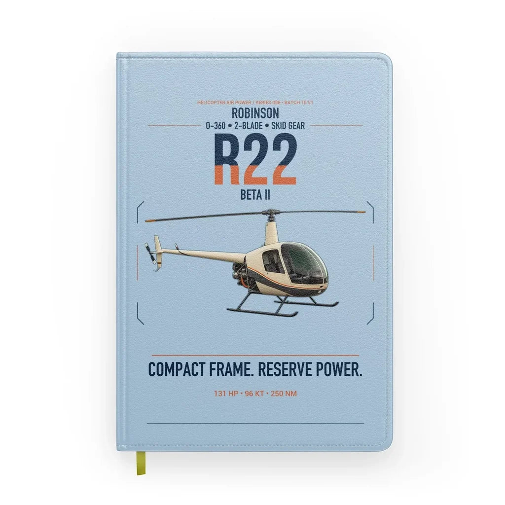 Robinson R22 Beta II design on light blue notebook