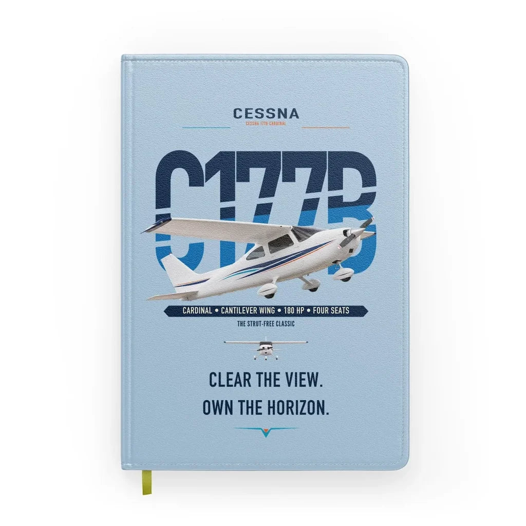 Cessna 177B Cardinal design on light blue notebook