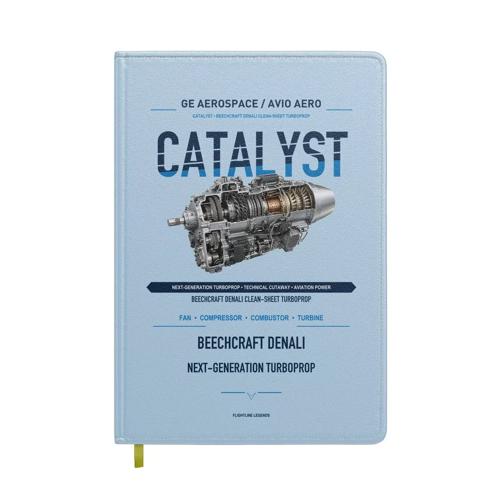 CATALYST design on light blue notebook