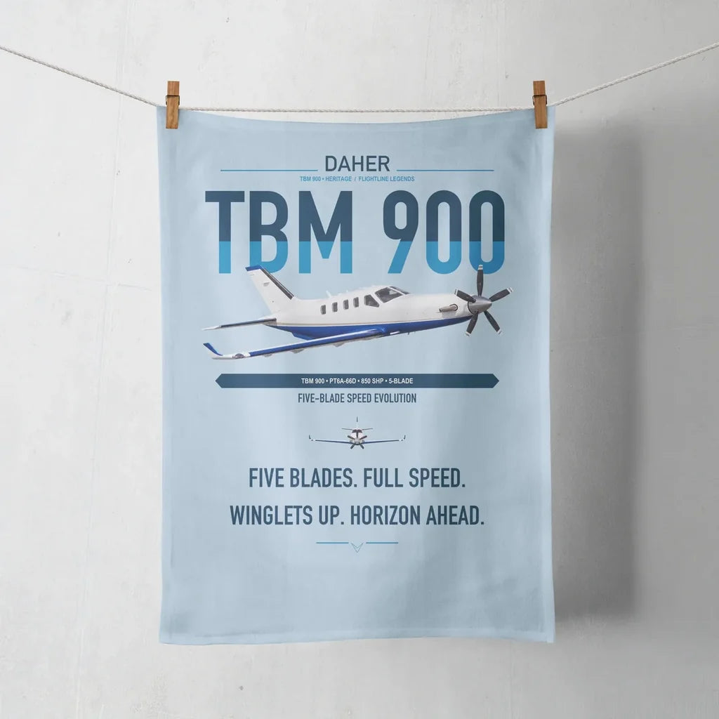 Daher TBM 900 design on light blue towel
