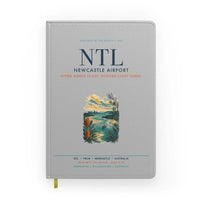 Thumbnail for Newcastle Airport (NTL) design on light gray notebook