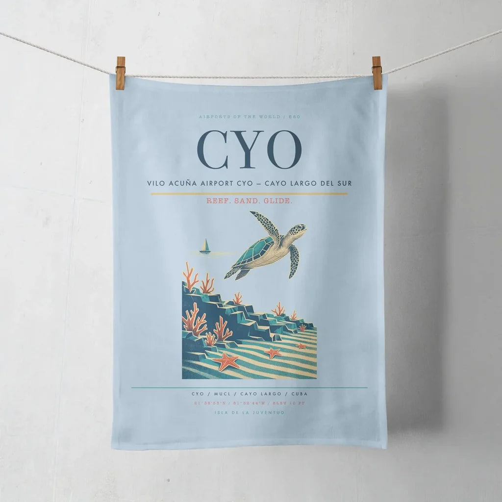 Vilo Acuña Airport (CYO) design on light blue towel