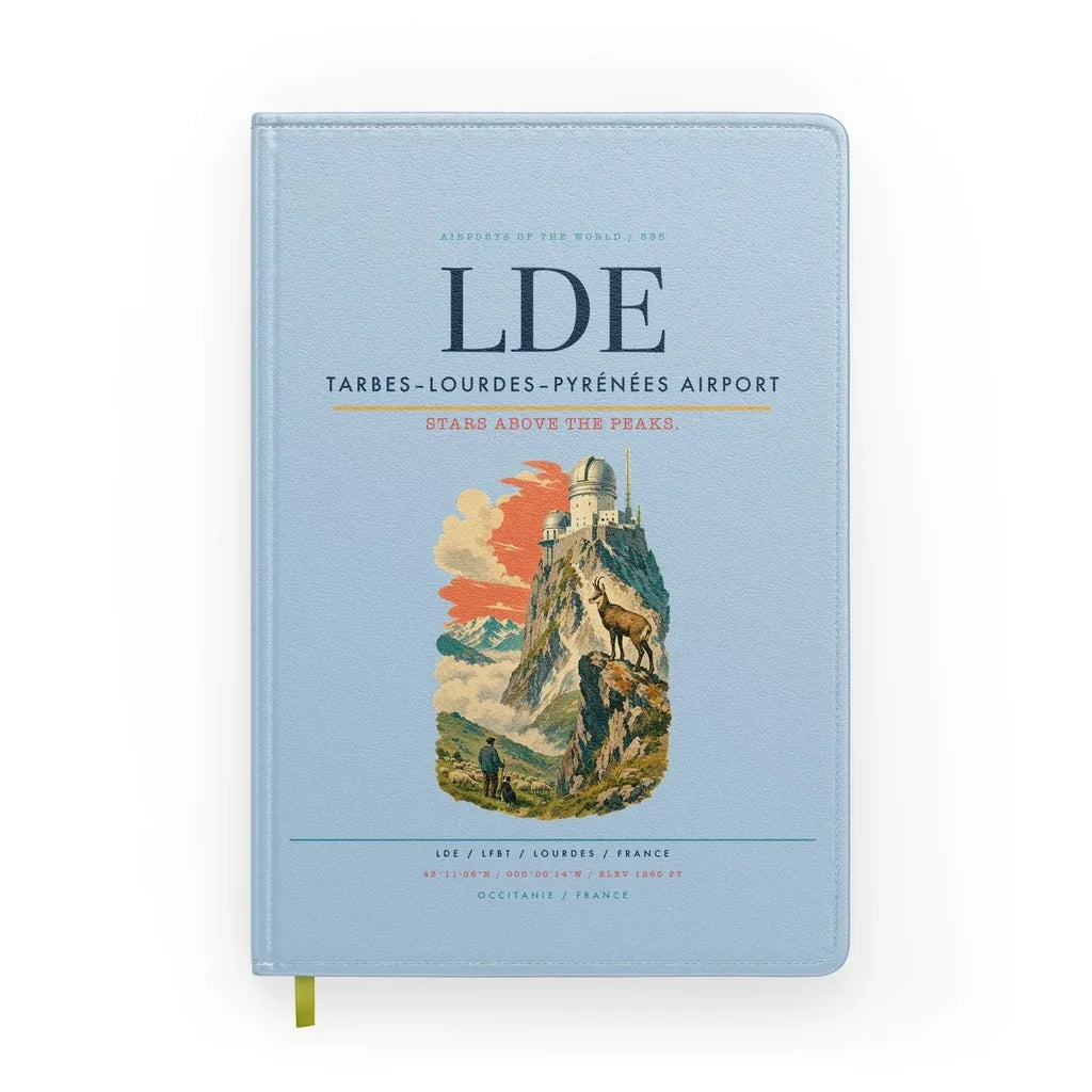 Tarbes–Lourdes–Pyrénées Airport (LDE) design on light blue notebook