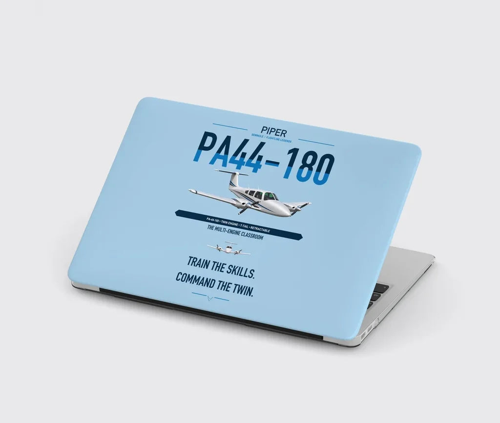 Piper PA-44-180 Seminole design on light blue MacBook case