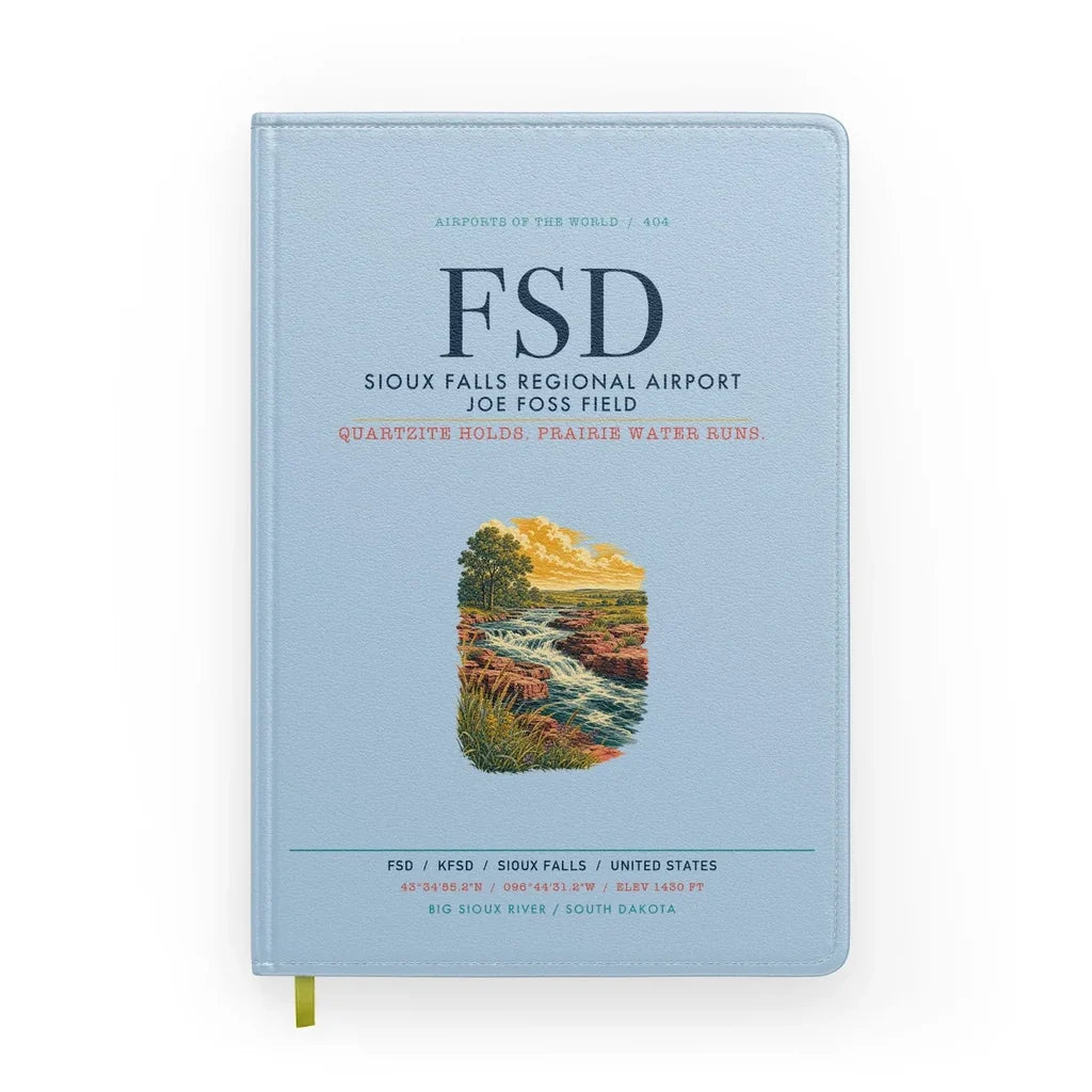 Sioux Falls Regional Airport Joe Foss Field (FSD) design on light blue notebook