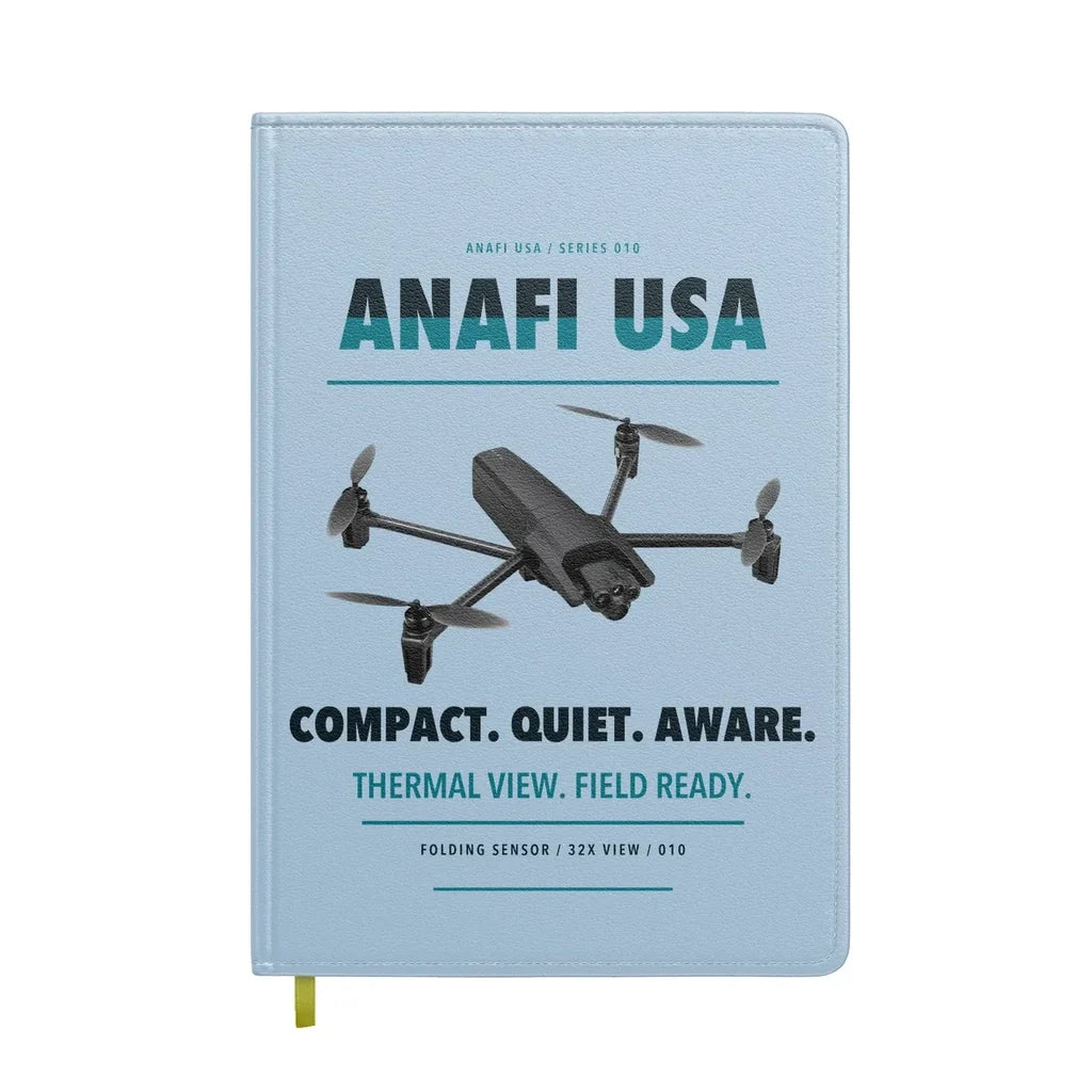 Parrot ANAFI USA design on light blue notebook
