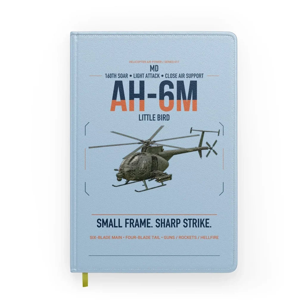 MD AH-6M Little Bird design on light blue notebook
