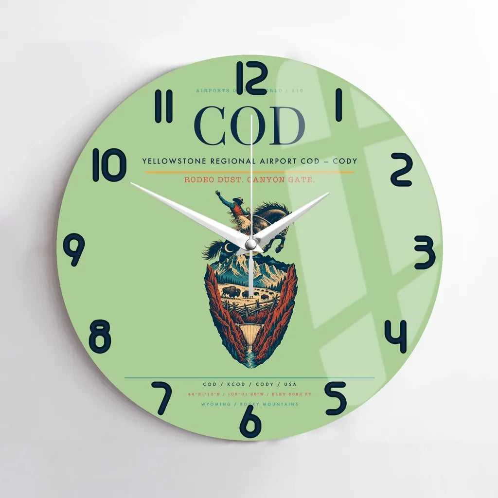 Yellowstone Regional Airport (COD) design on light green no frame wall clock