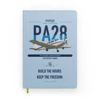 Thumbnail for Piper PA-28 Cherokee design on light blue notebook