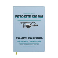 Thumbnail for Fotokite Sigma design on light blue notebook