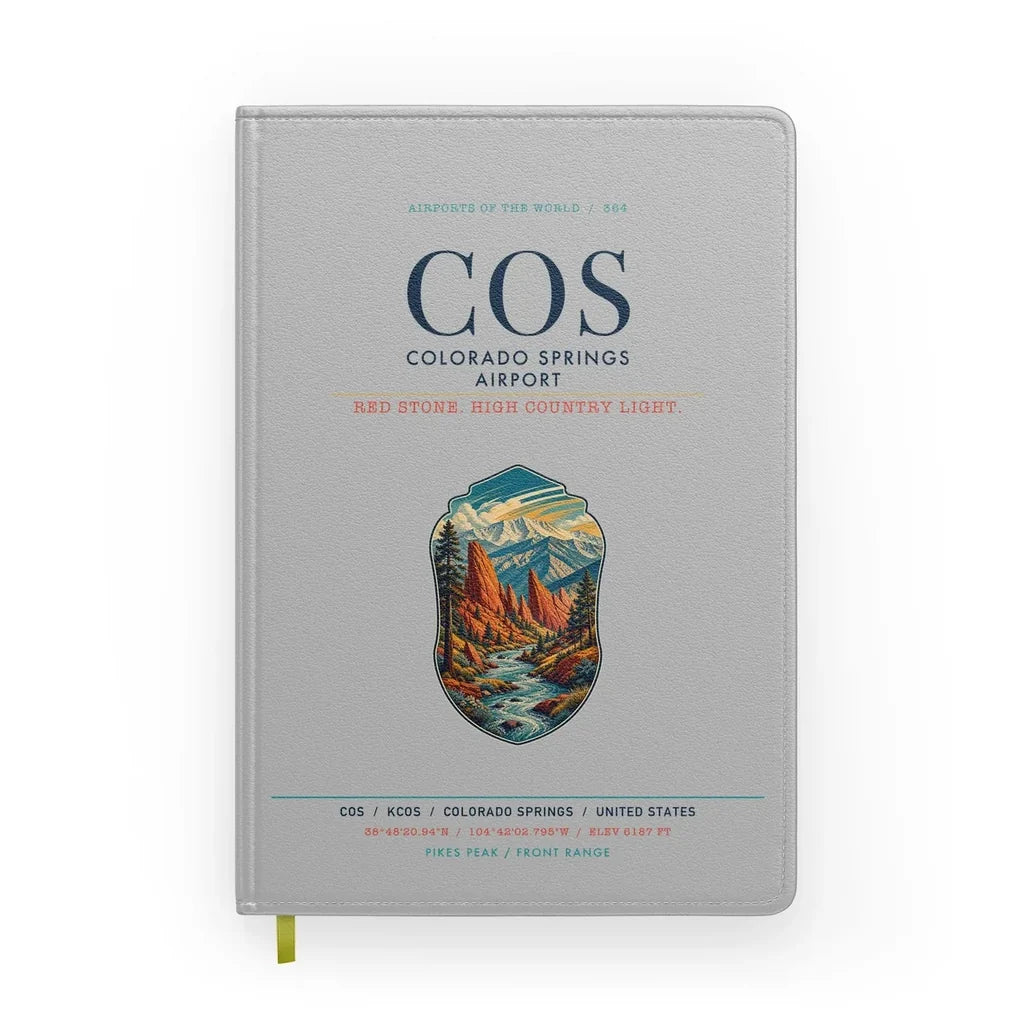 Colorado Springs Airport (COS) design on light gray notebook
