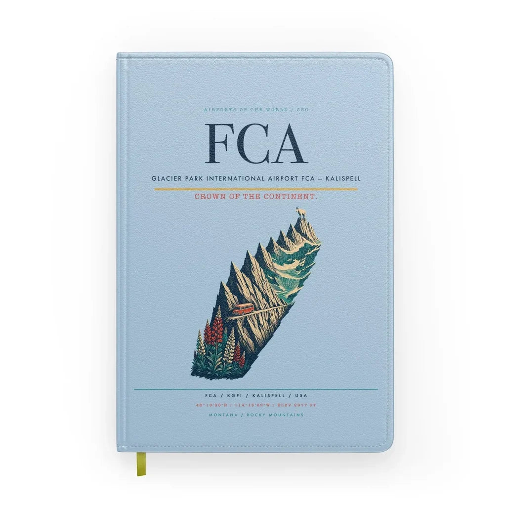 Glacier Park International Airport (FCA) design on light blue notebook