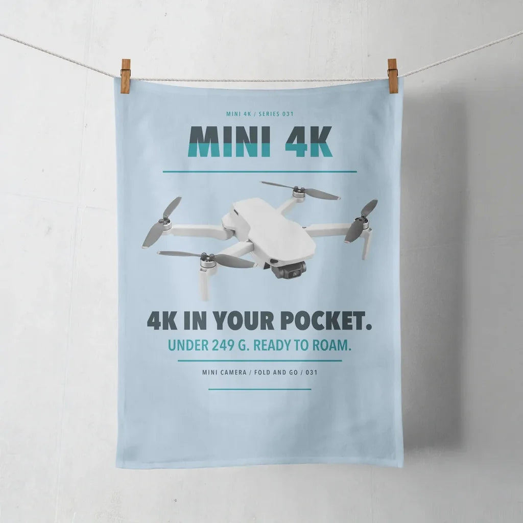 DJI Mini 4K design on light blue towel
