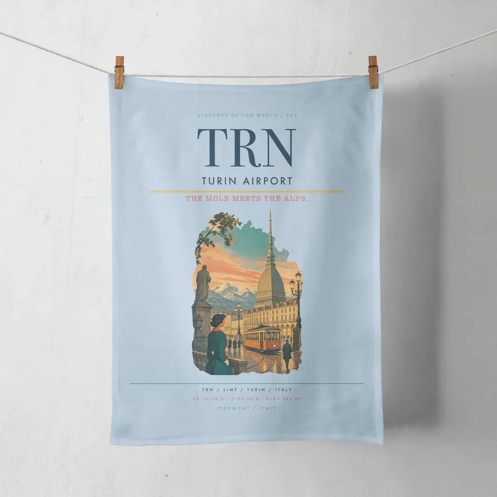 Turin Airport (TRN) design on light blue towel