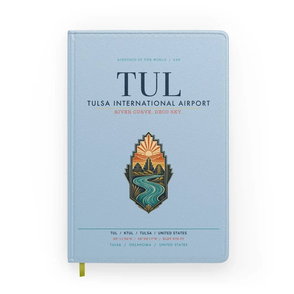 Tulsa International Airport (TUL) design on light blue notebook