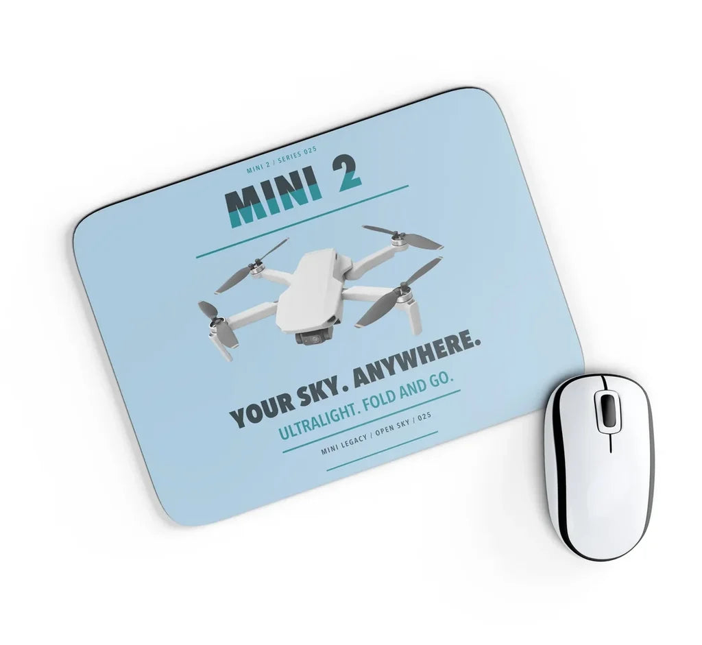 DJI Mini 2 design on light blue rectangle mouse pad