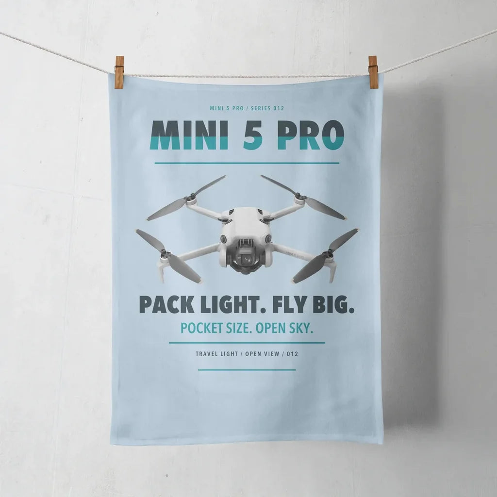 DJI Mini 5 Pro design on light blue towel