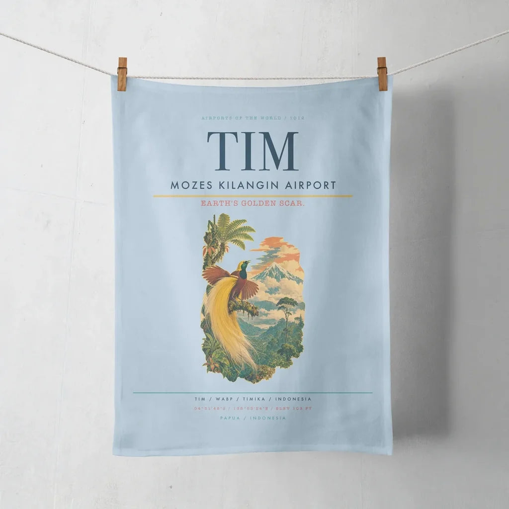 Mozes Kilangin Airport (TIM) design on light blue towel
