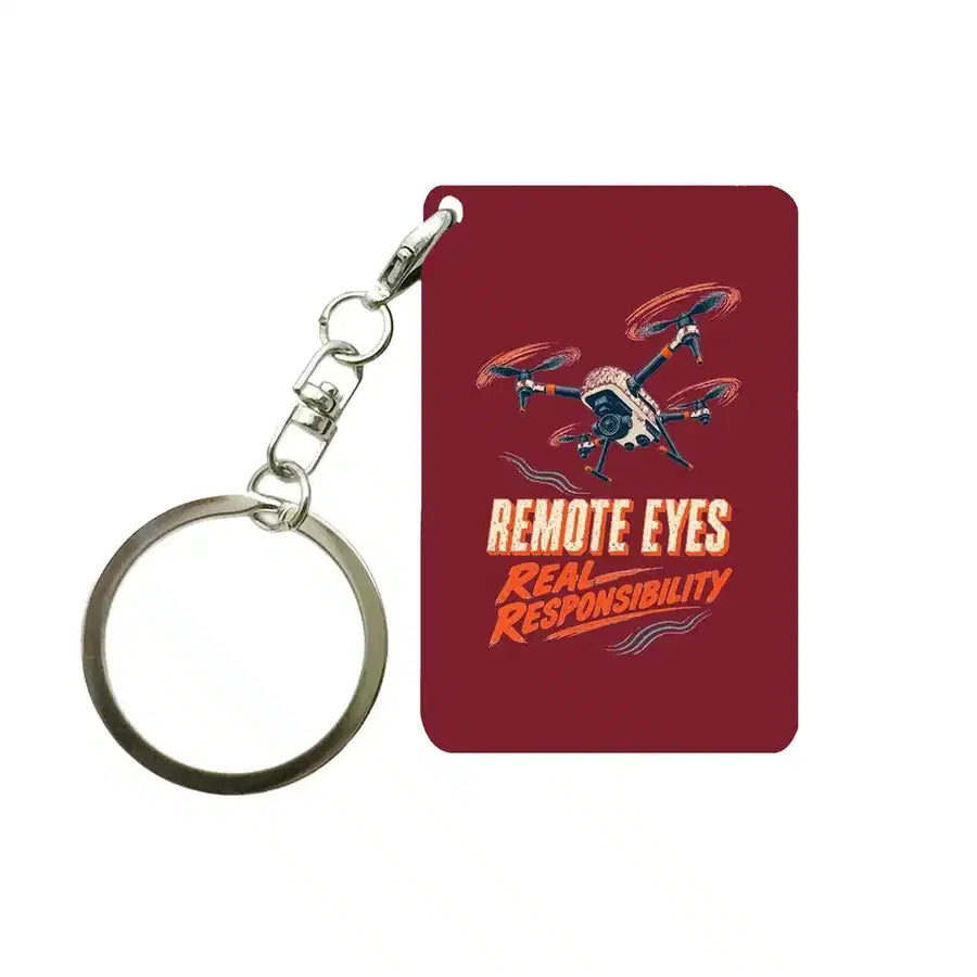 SIGNAL 584 - Remote Eyes Real Responsibility - Key Chain design on dark red key chain