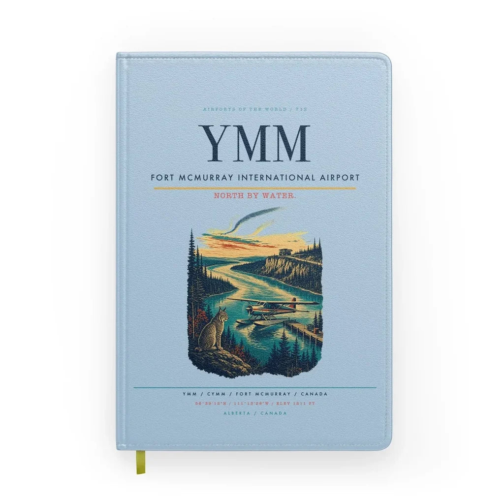 Fort McMurray International Airport (YMM) design on light blue notebook
