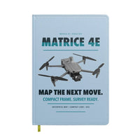 Thumbnail for DJI Matrice 4E design on light blue notebook