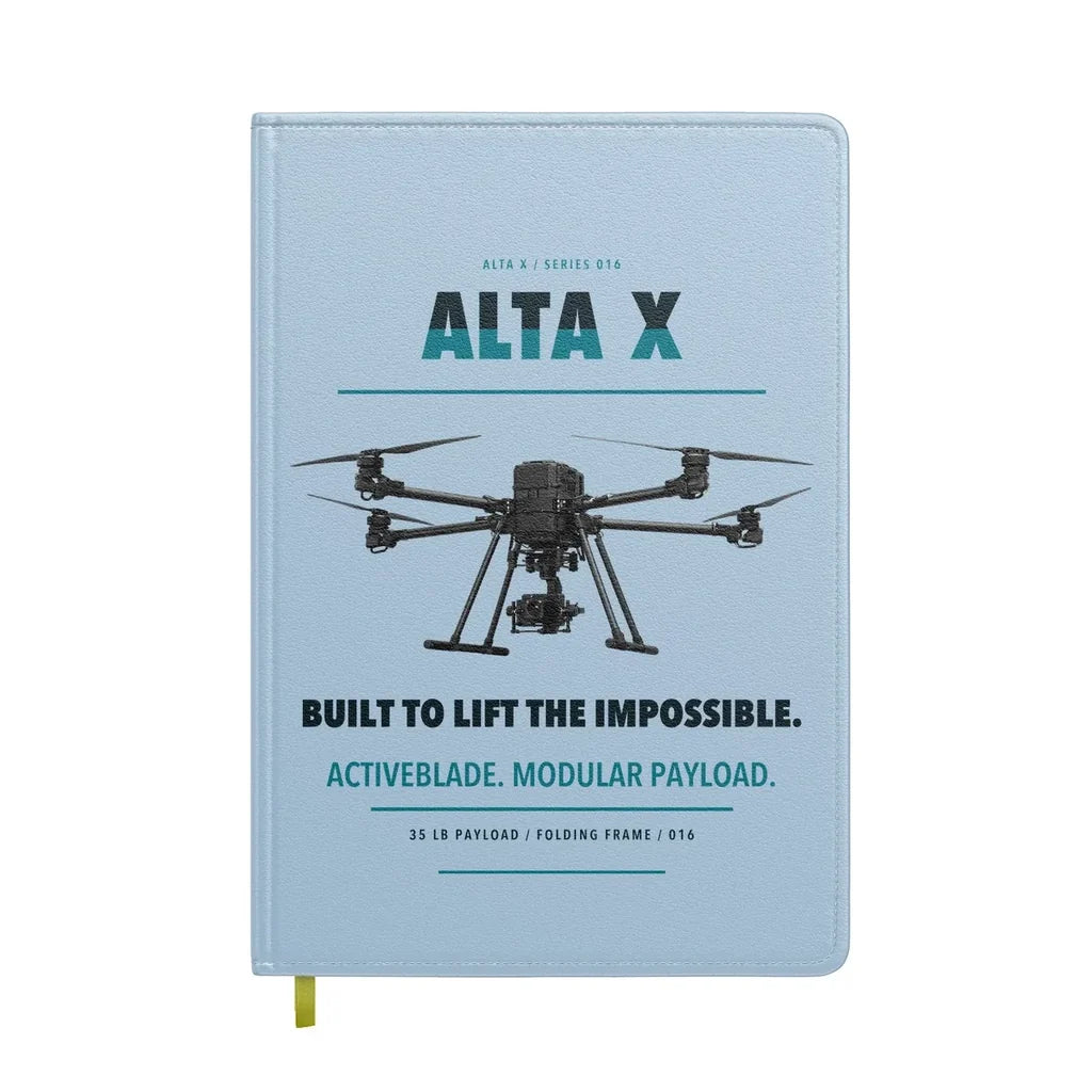 Freefly Alta X design on light blue notebook