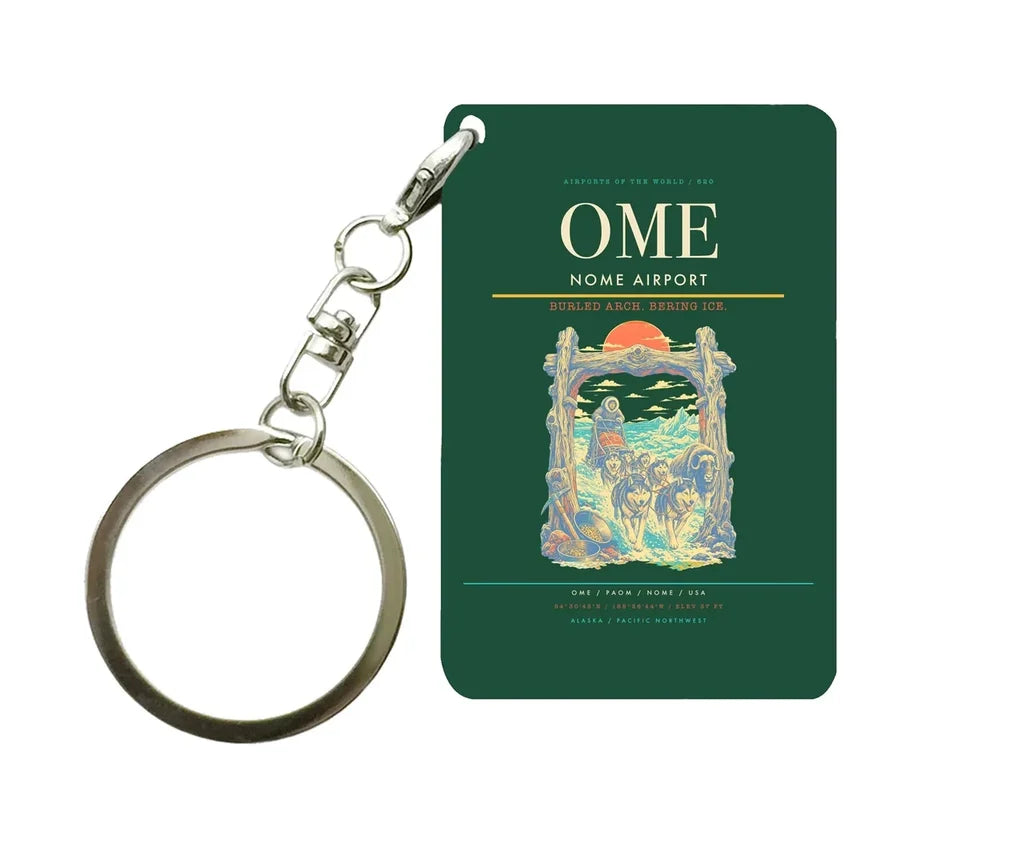 Nome Airport (OME) design on dark green key chain