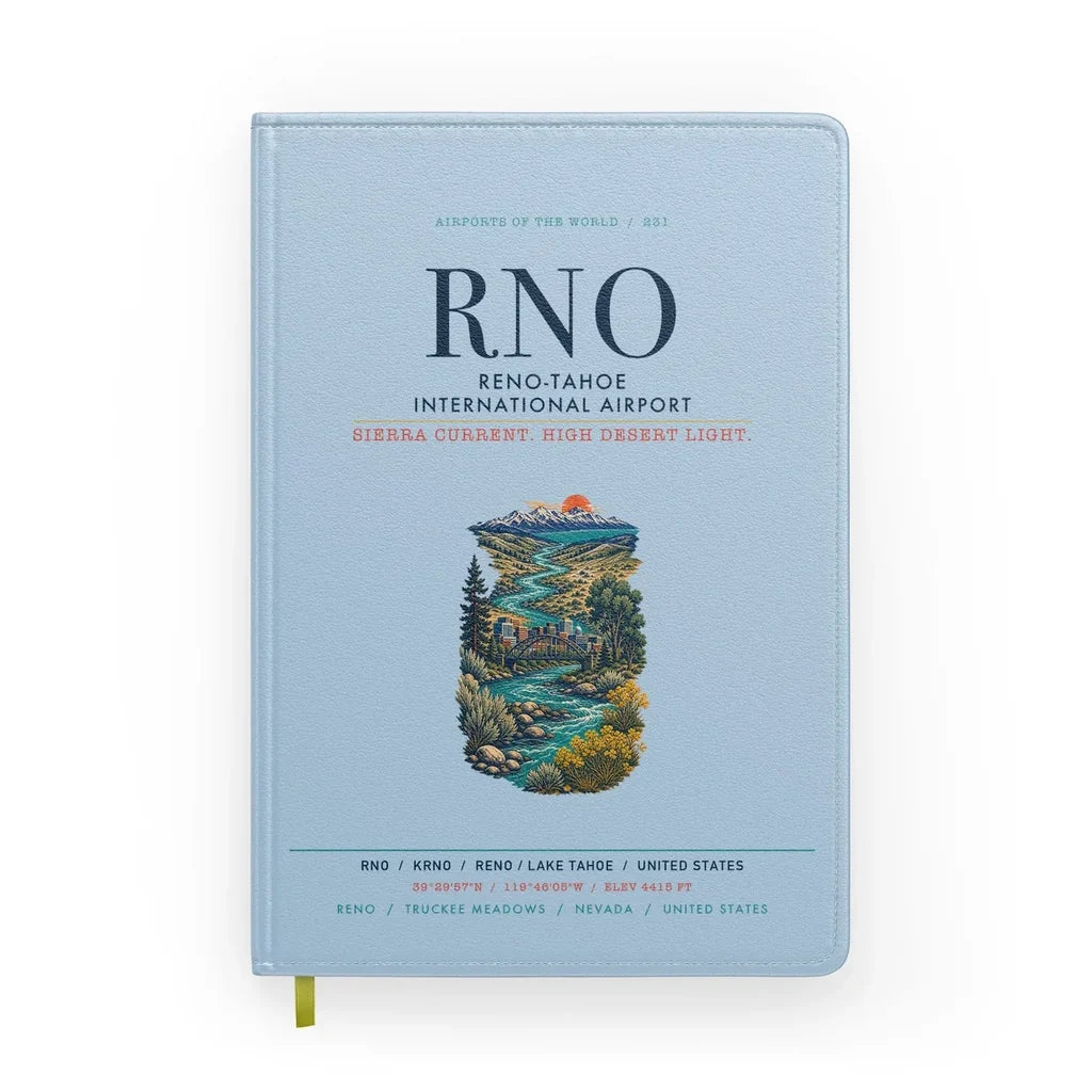 Reno-Tahoe International Airport (RNO) design on light blue notebook