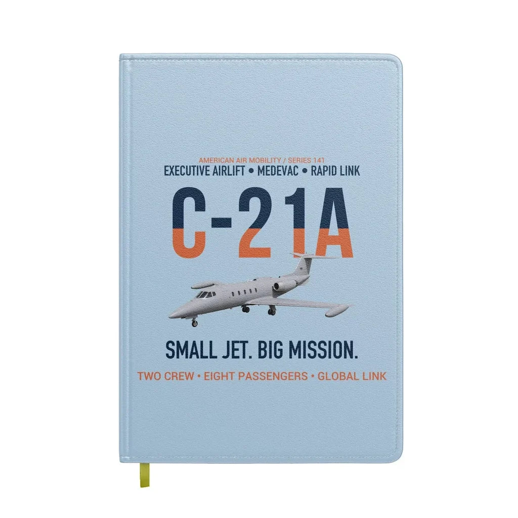 C-21A Learjet Small Jet Big Mission design on light blue notebook