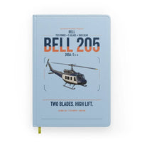 Thumbnail for Bell 205A-1++ design on light blue notebook