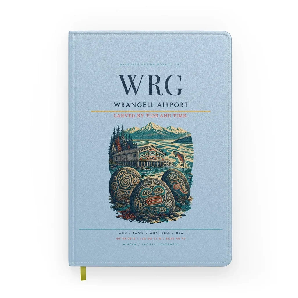Wrangell Airport (WRG) design on light blue notebook