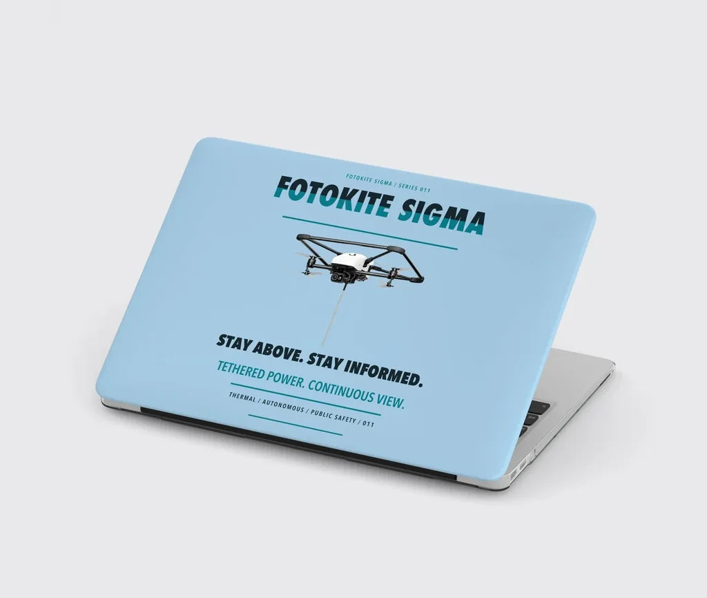 Fotokite Sigma design on light blue MacBook case