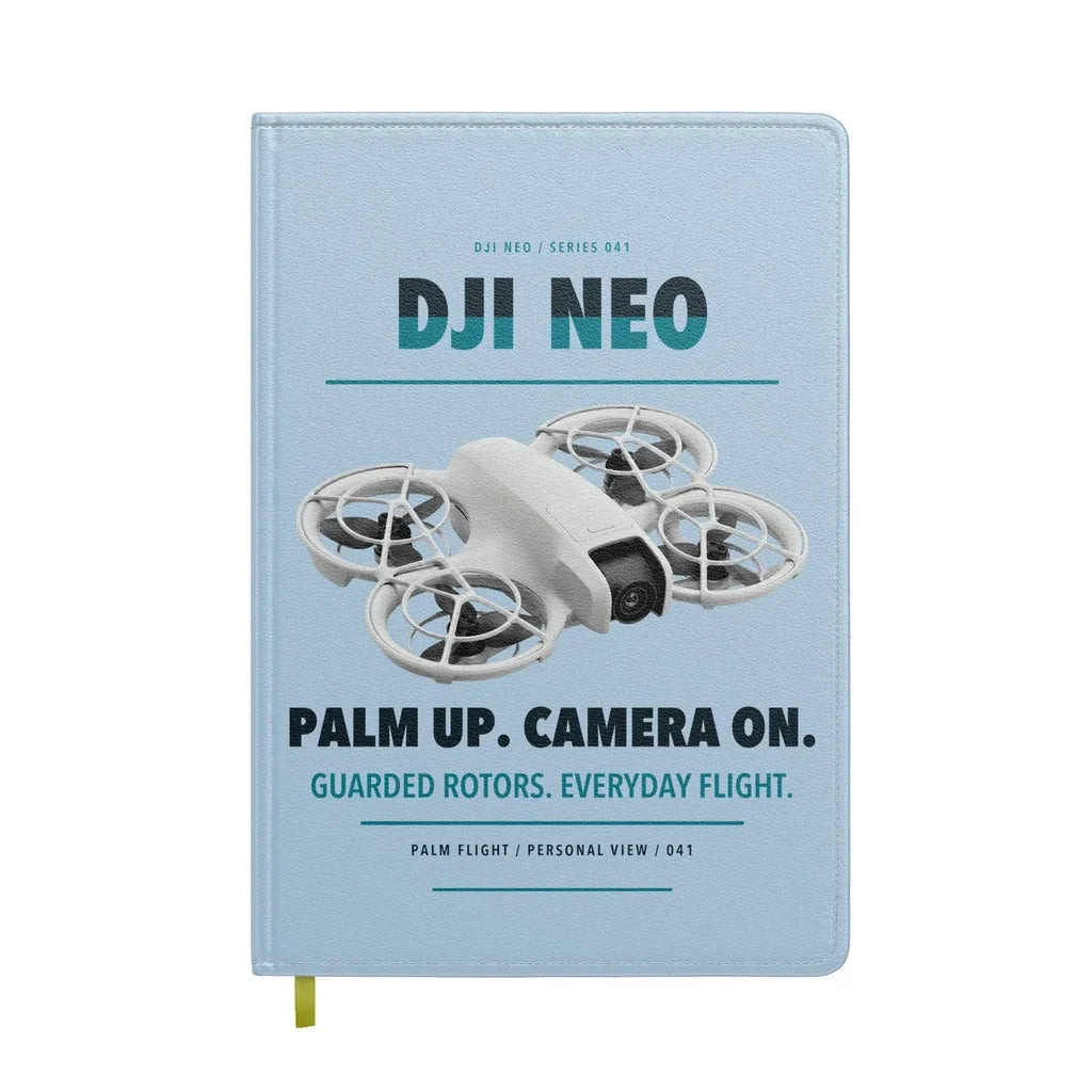 DJI Neo design on light blue notebook