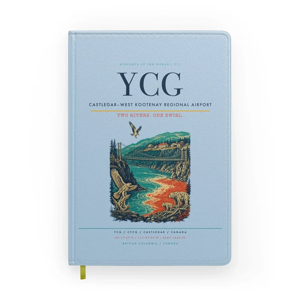 Castlegar–West Kootenay Regional Airport (YCG) design on light blue notebook