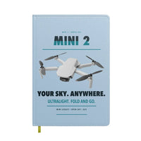 Thumbnail for DJI Mini 2 design on light blue notebook