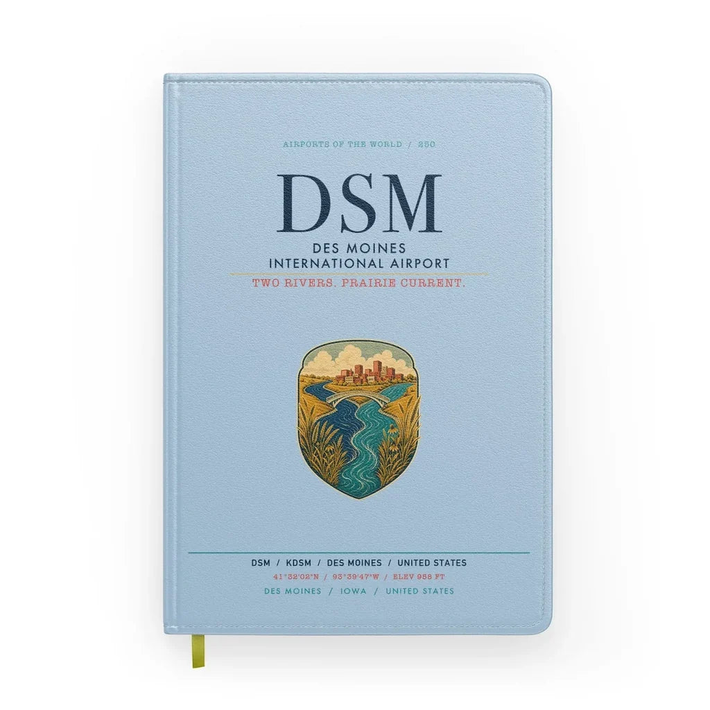 Des Moines International Airport (DSM) design on light blue notebook