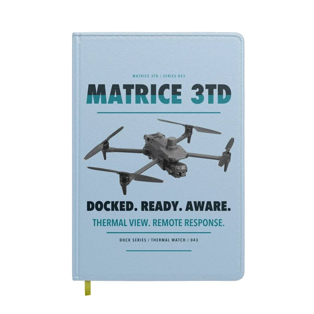 DJI Matrice 3TD design on light blue notebook
