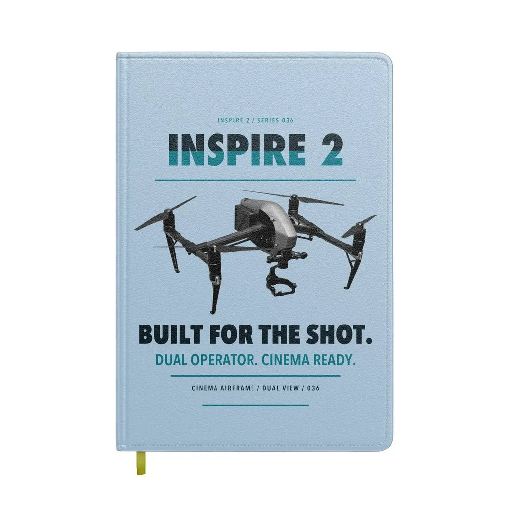 DJI Inspire 2 design on light blue notebook
