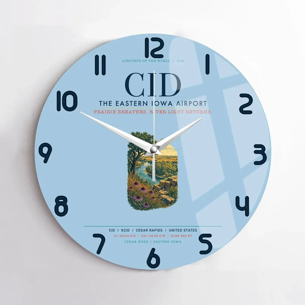 The Eastern Iowa Airport Cedar Rapids (CID) design on light blue no frame wall clock