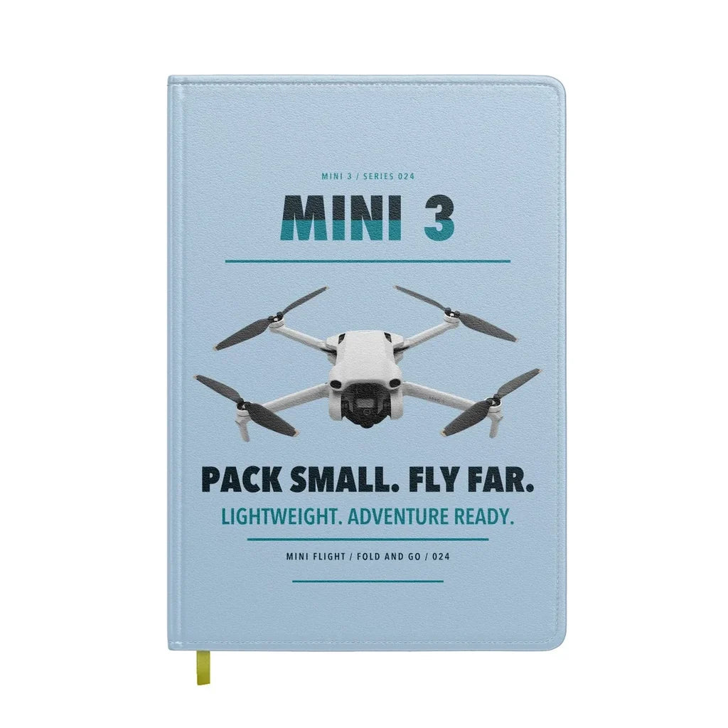 DJI Mini 3 design on light blue notebook