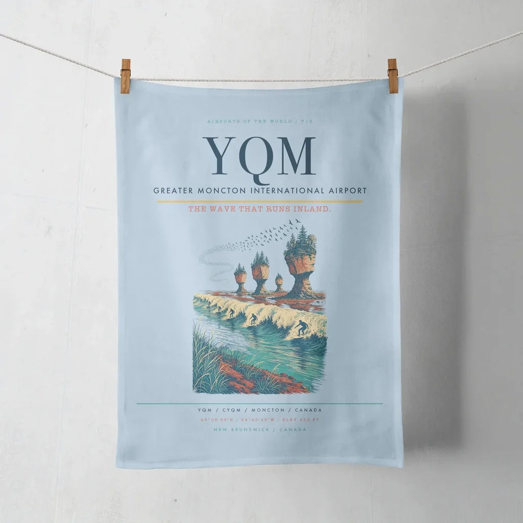Greater Moncton International Airport (YQM) design on light blue towel