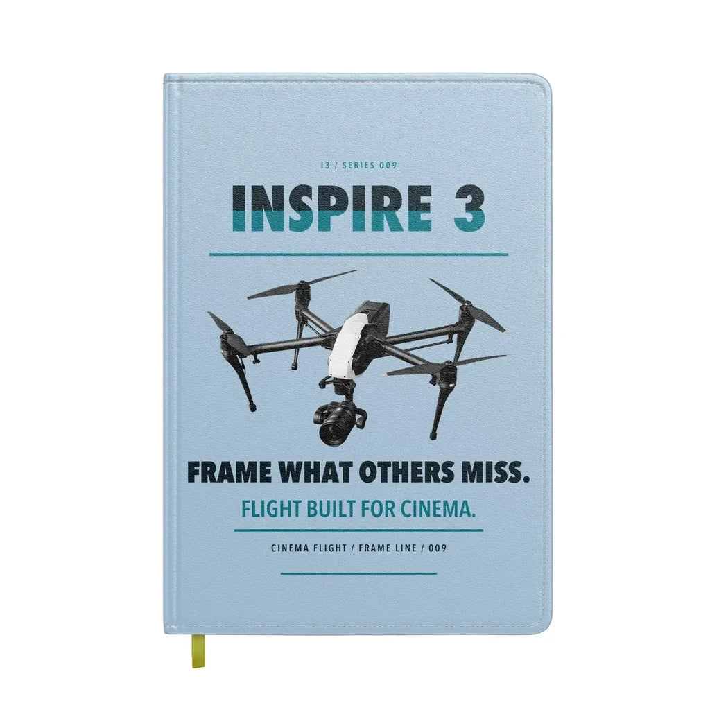 DJI Inspire 3 design on light blue notebook