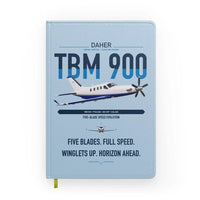 Thumbnail for Daher TBM 900 design on light blue notebook