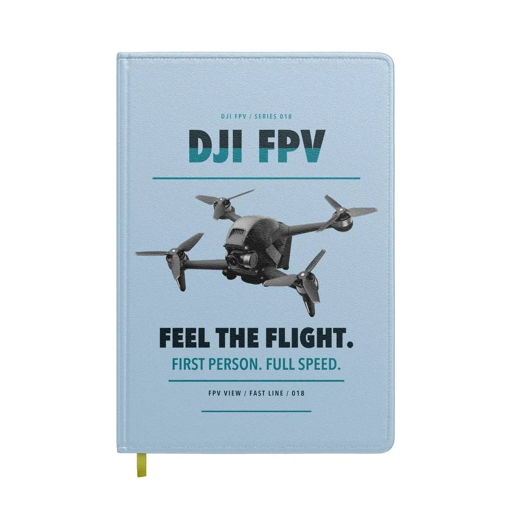 DJI FPV design on light blue notebook