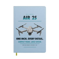Thumbnail for DJI Air 2S design on light blue notebook