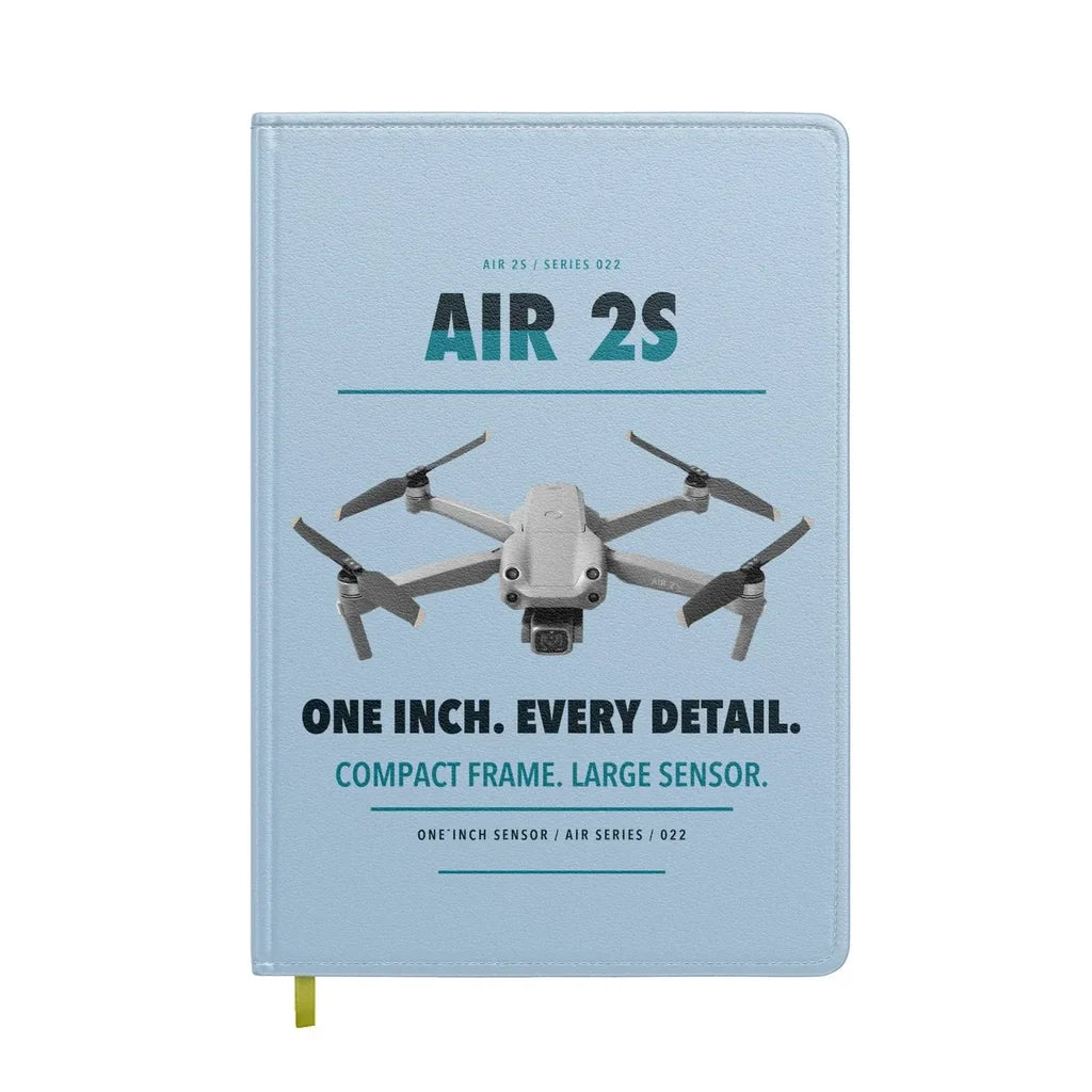 DJI Air 2S design on light blue notebook
