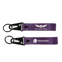 Thumbnail for FlyArystan Airlines Hawk-shaped key chain, Purple+ NAME